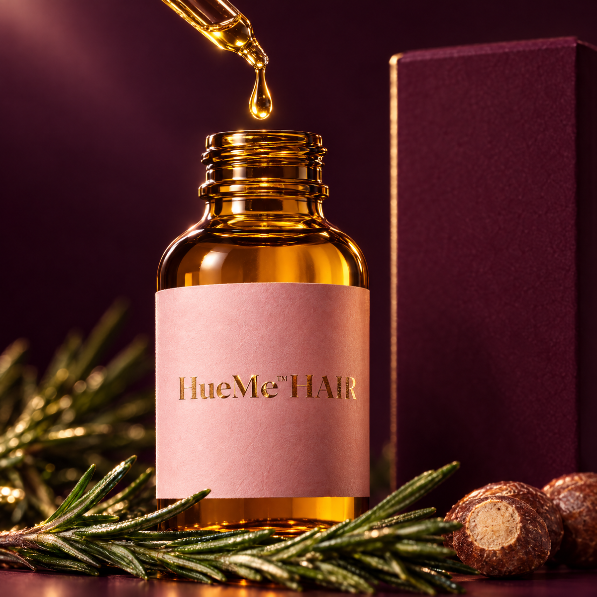 A drop of HueMe™ Hair batana oil